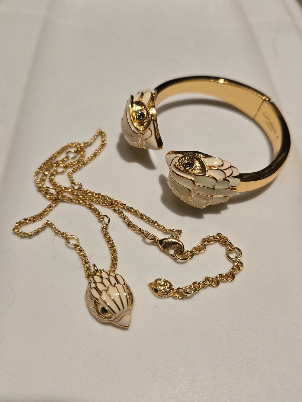 Kurt Geiger Gold and White Swan Bracelet with Matching Pendant Necklace